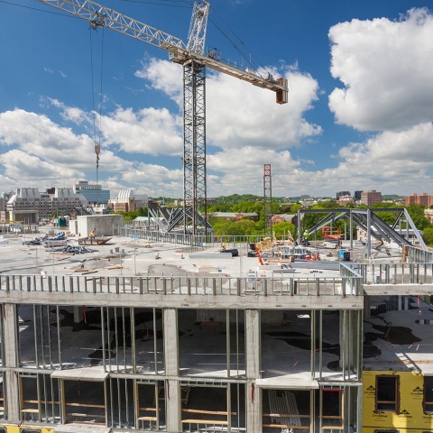 Crain Construction Aertson under construction with scaffolding and crains