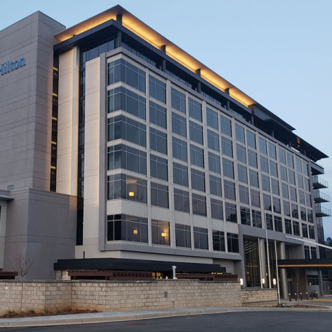 the outside of a modern hotel in Alpharetta Georgia