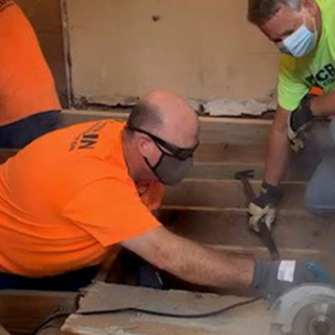 Crain Volunteers working on a kitchen installation