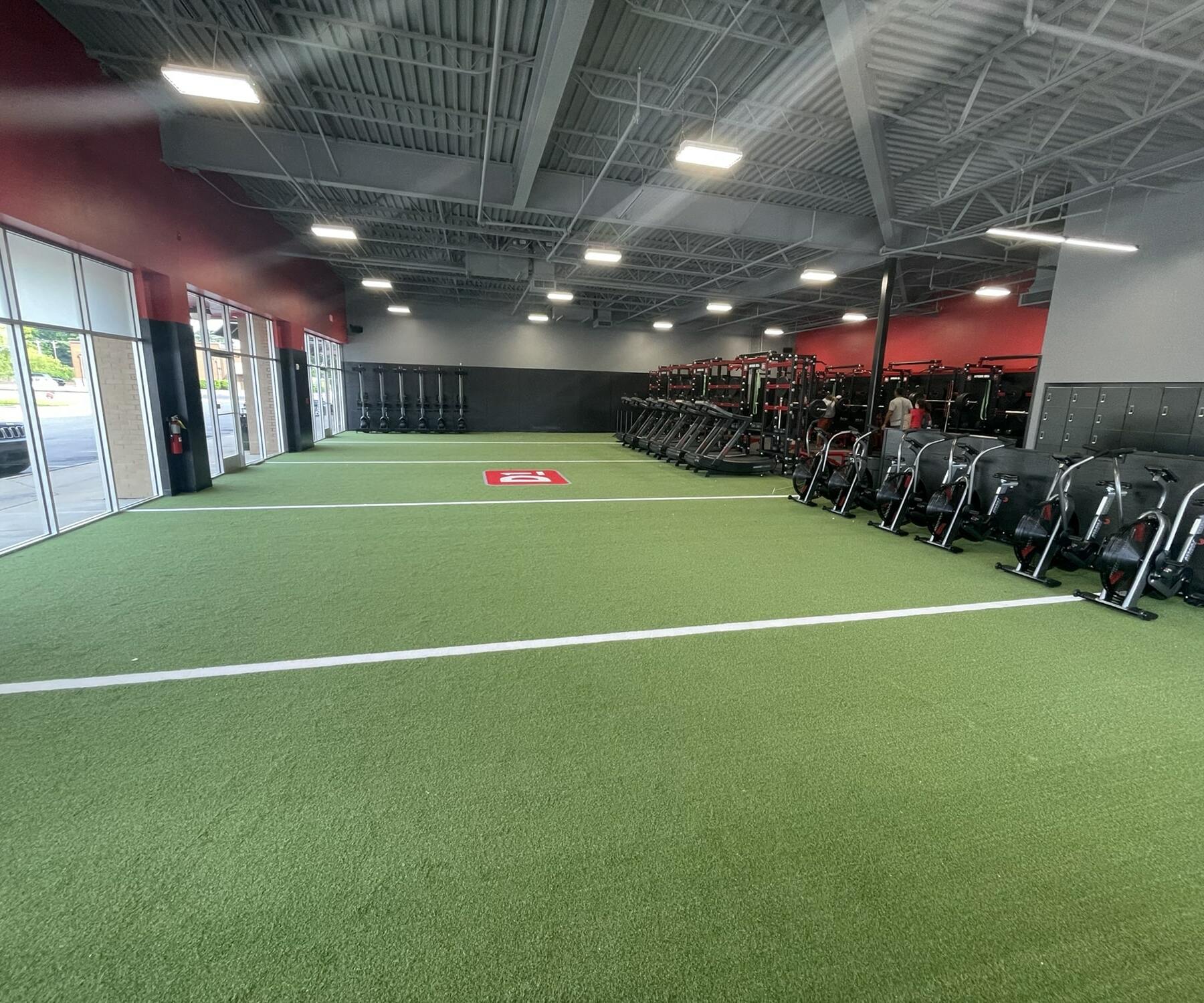 Wide shot of the turf field inside a D1 Training Facility in Spring Hill