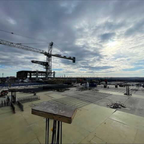 BNA Hilton pouring the rooftop pool deck on a cloudy day
