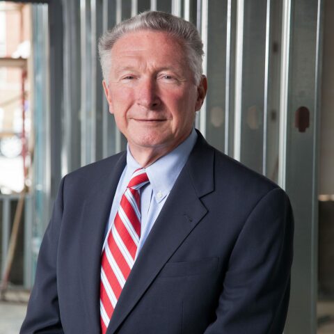 Lewis Rankina, a Crain Construction past CEO, in a professional portrait.