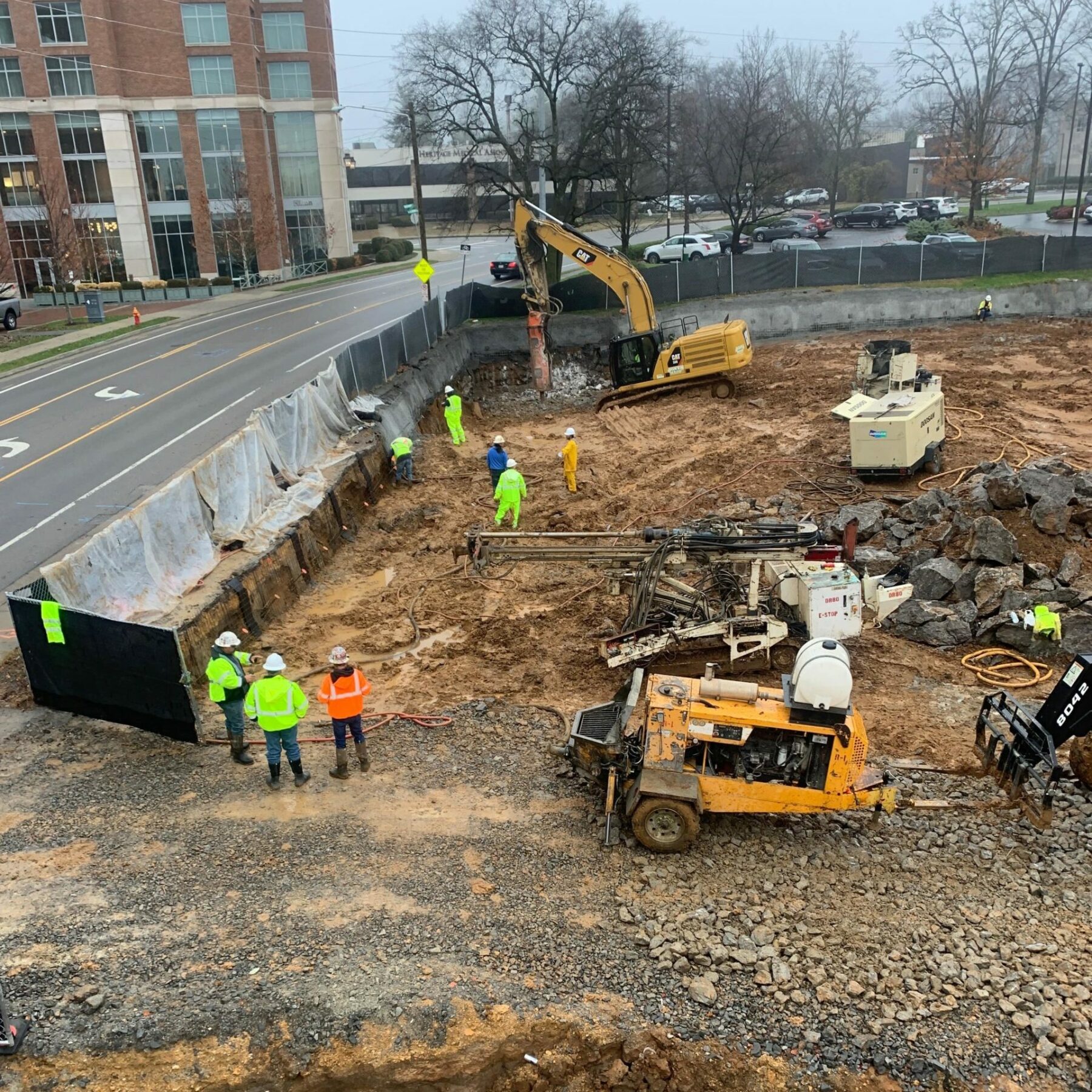 Construction workers busy doing dirt work at the Crestmoor site in Nashville