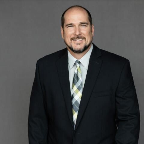 Chad Thomas, a dedicated Crain Construction team member, in a professional portrait