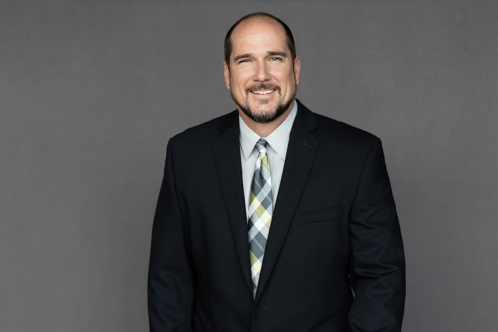 Chad Thomas, a dedicated Crain Construction team member, in a professional portrait