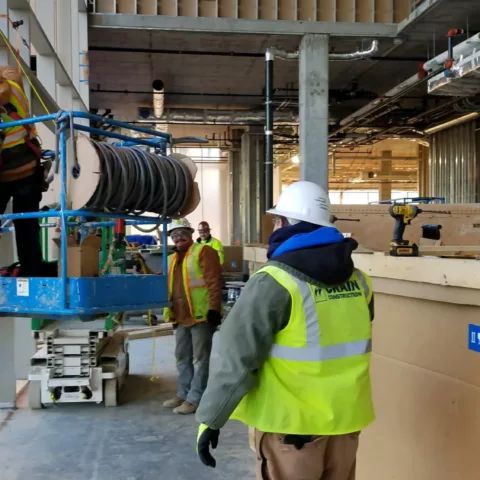 crain construction workers on the job