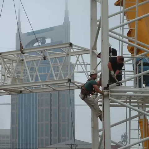 construction workers working on Hampton Inn Tower in Nashville
